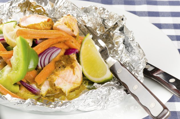 baked salmon with vegetables in a foil