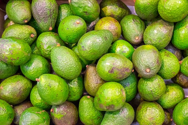 Avocados for sale at a market
