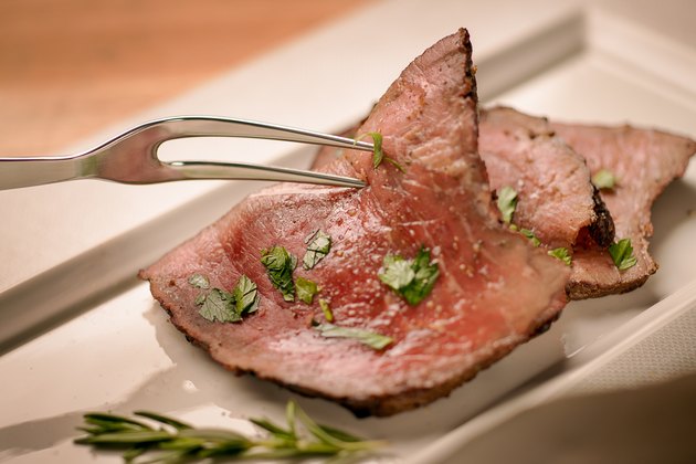 Roast beef and serving fork