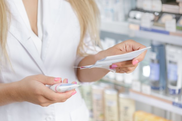 Close up of a pharmacist checking the prescription