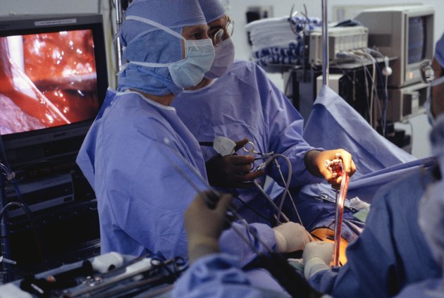 Surgeons operating