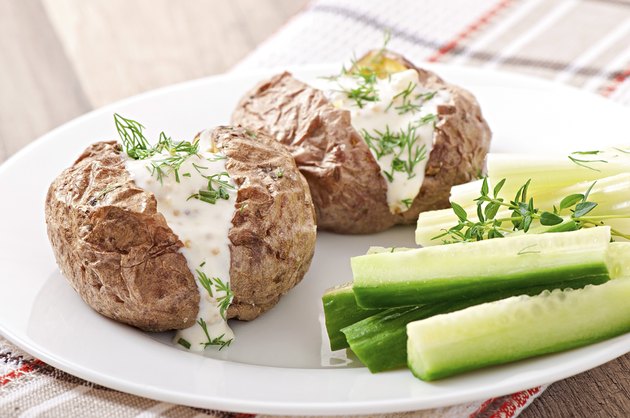Baked potato filled with sour cream