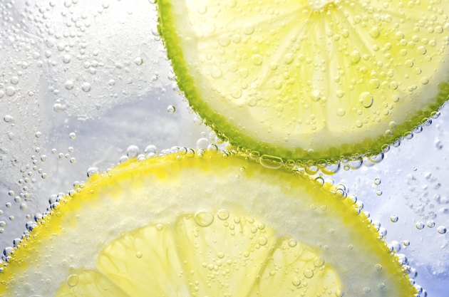 Lemon and lime in glass