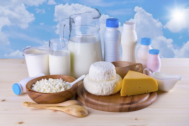Composition of dairy products on sky background
