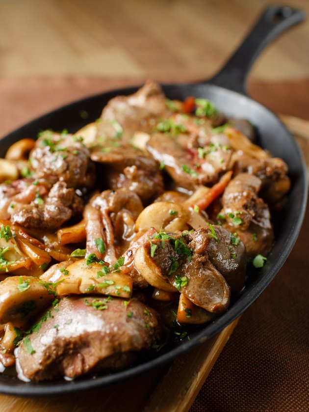 Liver baked with mushrooms, bacon and herbs