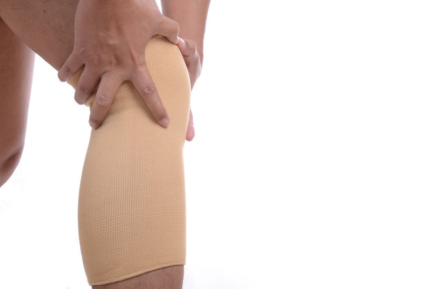 Man leg with brace knee support protection pain problem