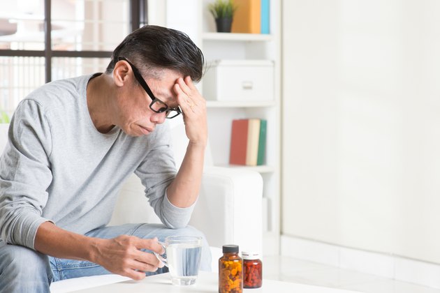 Mature Asian Chinese man headache