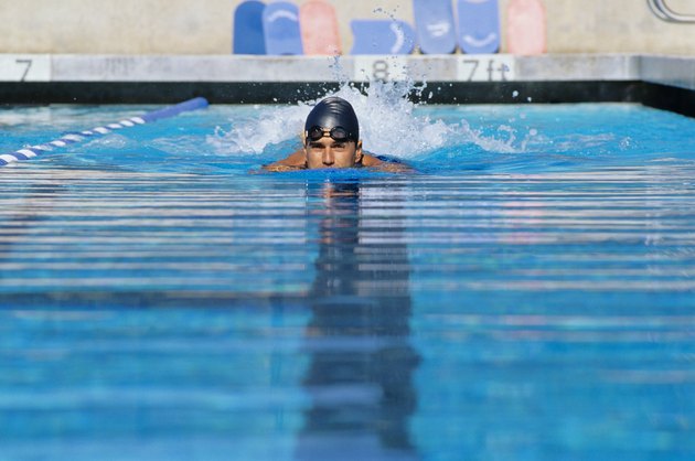 Young woman swimming in pool