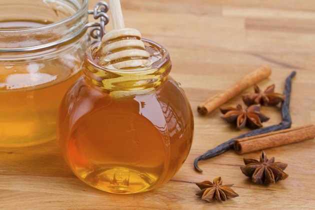pots of honey and spices