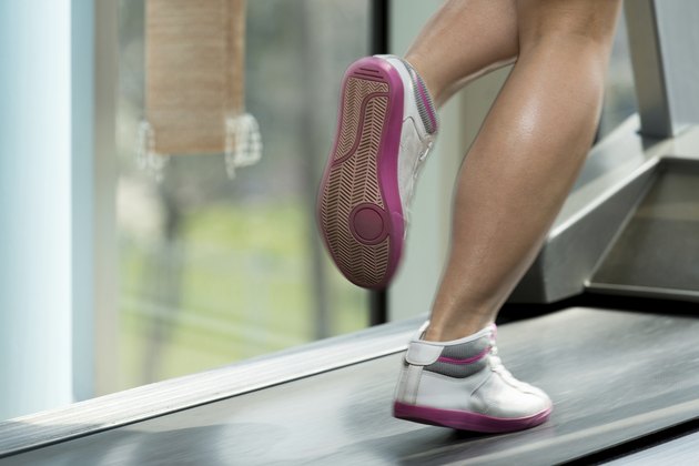 Woman Feet On Treadmill