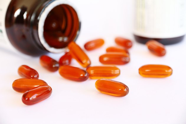 gel vitamin supplements on white