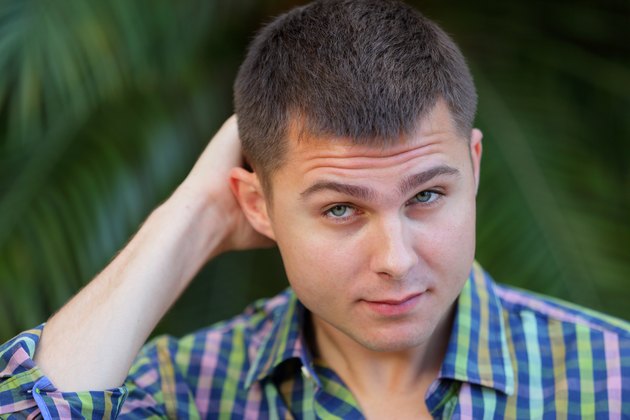 Man scratching his head