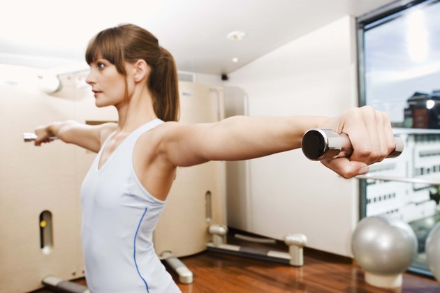 Woman stretching at gym