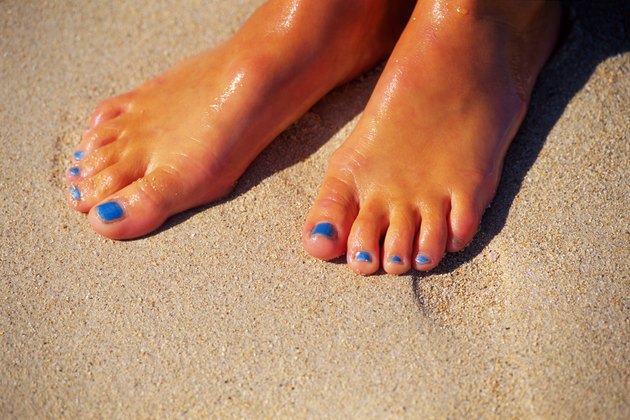 Woman's feet in sand
