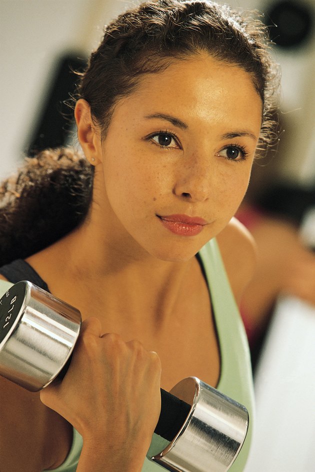 Woman lifting dumbbell