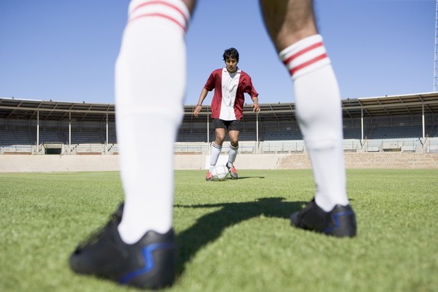 Men playing soccer