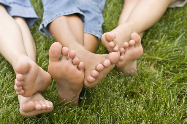 feet in grass