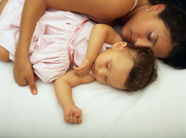 Mother and daughter napping