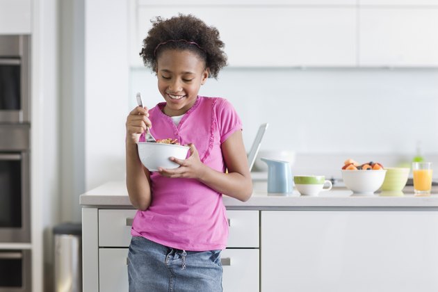 Girl Eating Cereal for Breakfast