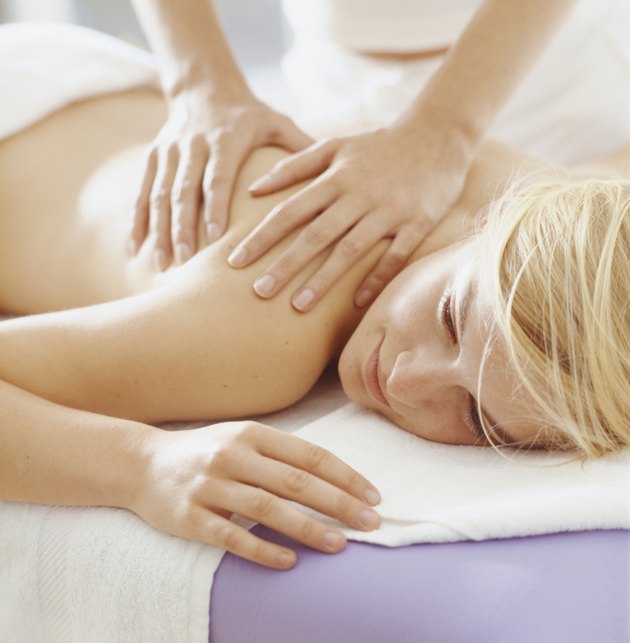 Young woman having massage, close-up