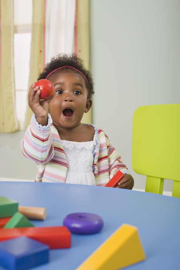Girl playing with toys