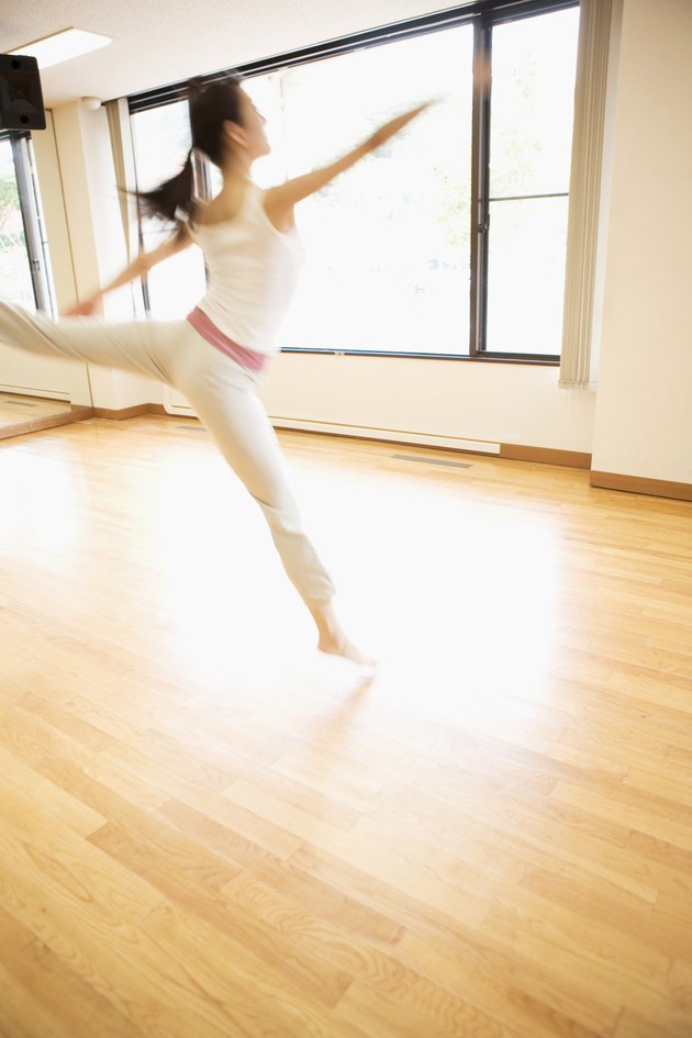 Young woman exercising in a gym
