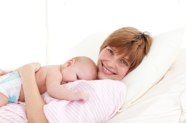 Happy mother with her baby