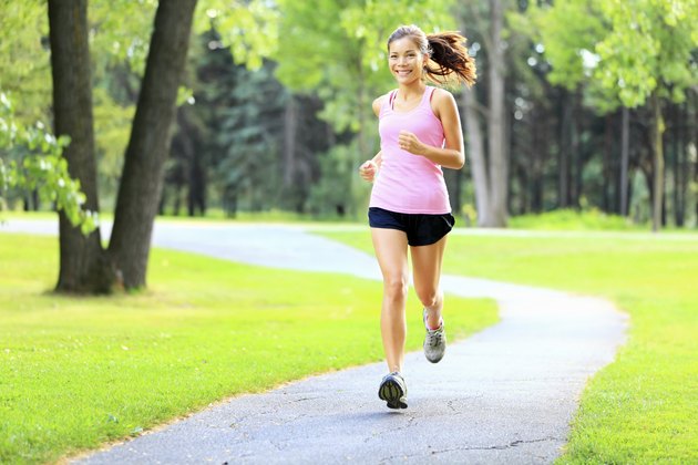 Running woman in park