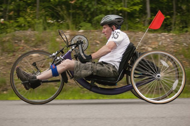 Man with spinal cord injury participating in a handcycle race