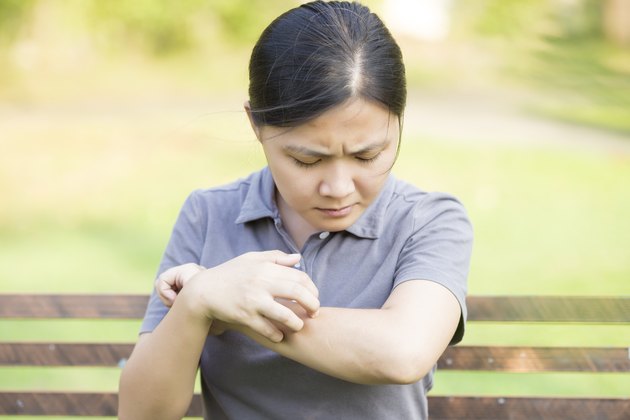 Woman Scraching her Self