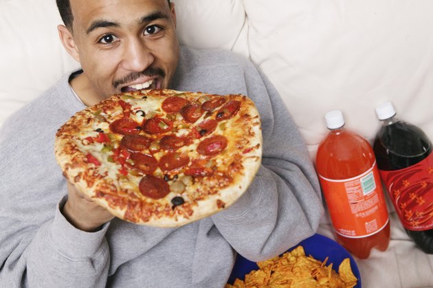 Man eating pizza