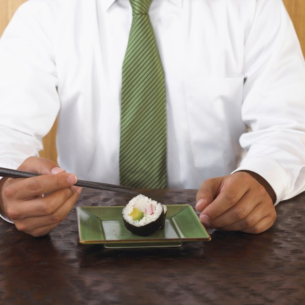 Man eating sushi