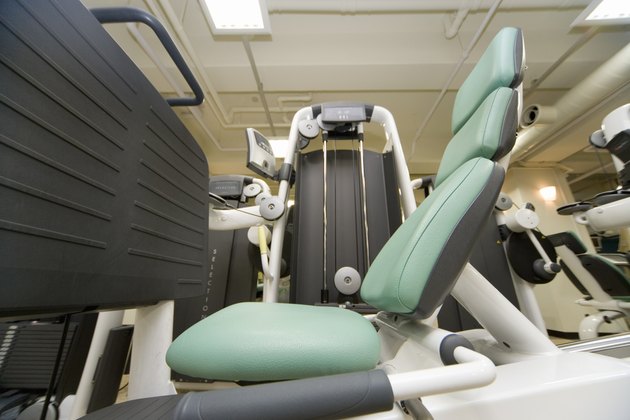 Exercise machines in gym, side view, close up, differential focus