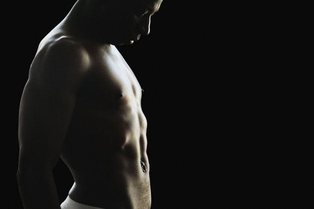 Studio shot of African man with bare chest