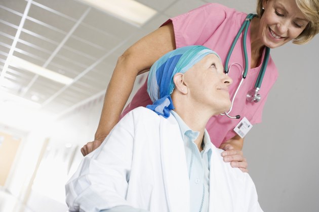 Medical Staff Pushing Patient in Wheelchair