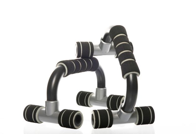 push-up bars with reflection in a studio