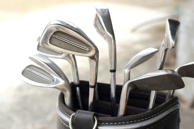 metal golf clubs in bag