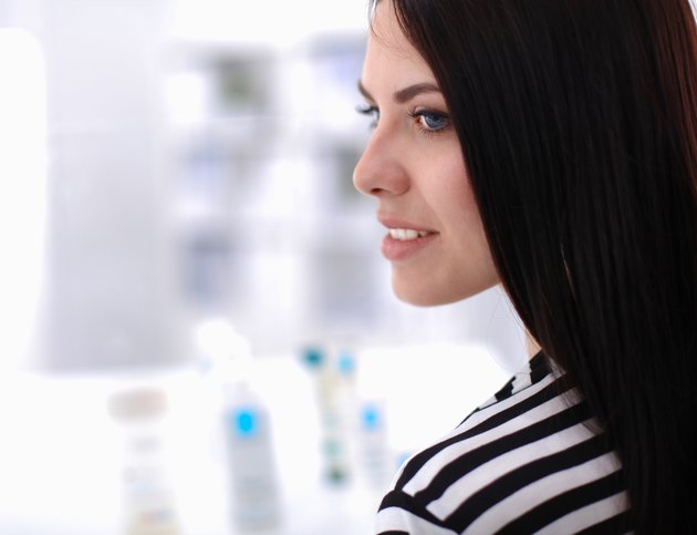 Beautiful young woman in shop