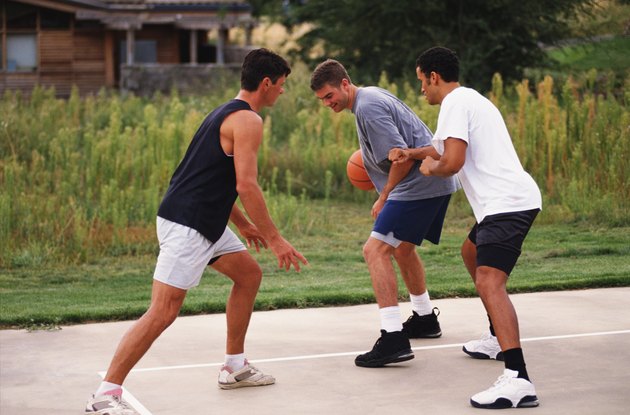 Men Playing Basketball