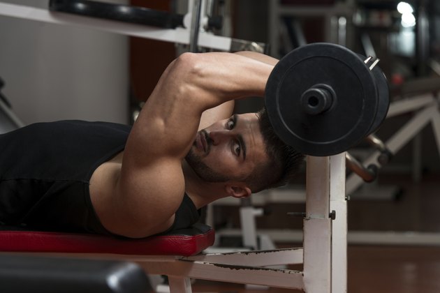 Young Men Doing Exercise For Triceps