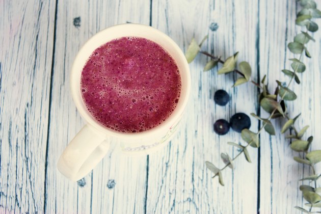 Beet juice on wooden table