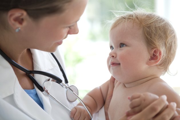 Cute baby at doctor's office.