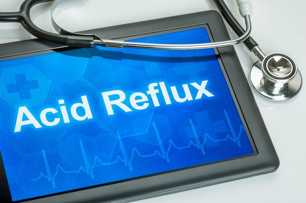 Tablet with the diagnosis Acid Reflux on the display