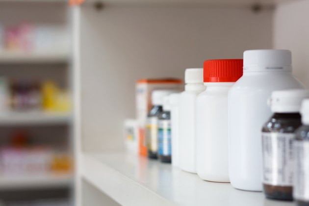 bottles on pharmacy store shelf