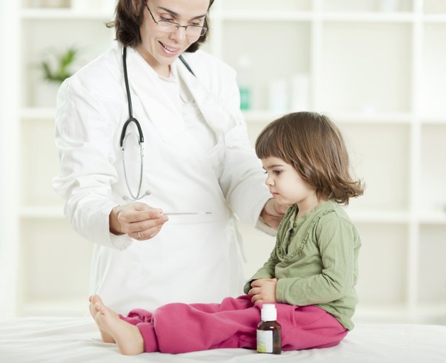 Little girl visiting a pediatrician