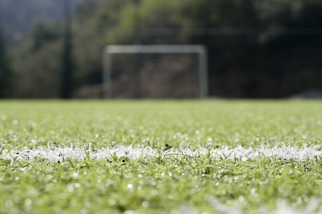 Football goal post on empty pitch, Turkey, Istanbul