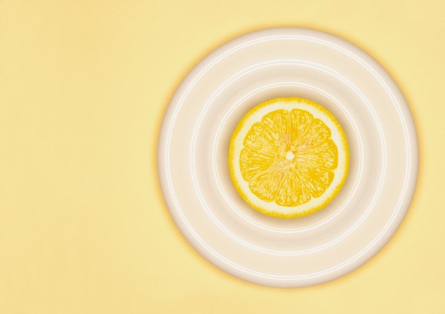 Sliced lemon on plate