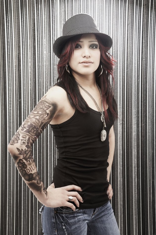 Young Hispanic woman with tattoos