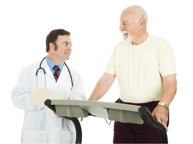 Fit Senior Man Consults Doctor