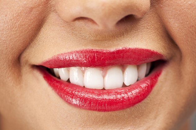 Big smile with bright red lipstick